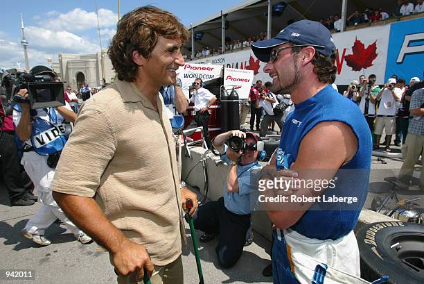 Alex Zanardi returns to the track and greets Alex Tagliani who was involved in his life threatening accident in September 2001 in Germany, during the...