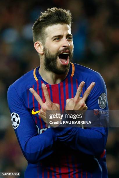 Barcelona's Spanish defender Gerard Pique celebrates a goal during the UEFA Champions League quarter-final first leg football match between FC...