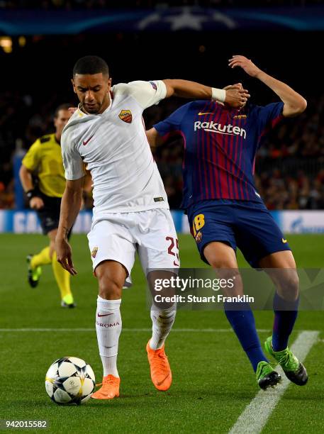 Bruno Peres of AS Roma fouls Jordi Alba of Barcelona during the UEFA Champions League Quarter Final Leg One match between FC Barcelona and AS Roma at...