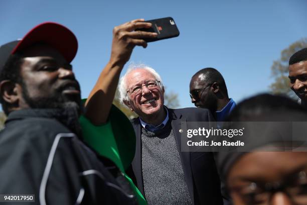 Sen. Bernie Sanders joins with others during an event to mark the 50th anniversary of Dr. Martin Luther King Jr.'s assassination April 4, 2018 in...