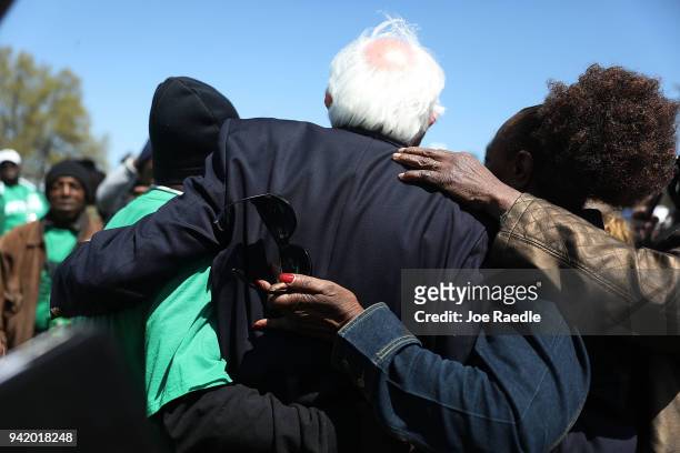 Sen. Bernie Sanders joins with others during an event to mark the 50th anniversary of Dr. Martin Luther King Jr.'s assassination April 4, 2018 in...