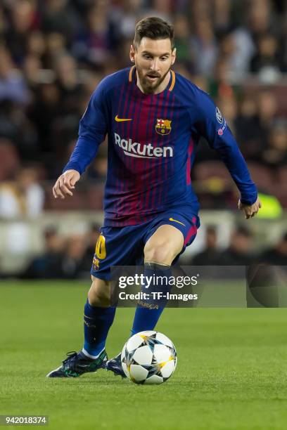 Lionel Messi of Barcelona controls the ball during the UEFA Champions League Quarter-Final first leg match between FC Barcelona and AS Roma at Camp...