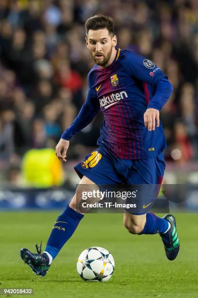 Lionel Messi of Barcelona controls the ball during the UEFA Champions League Quarter-Final first leg match between FC Barcelona and AS Roma at Camp...