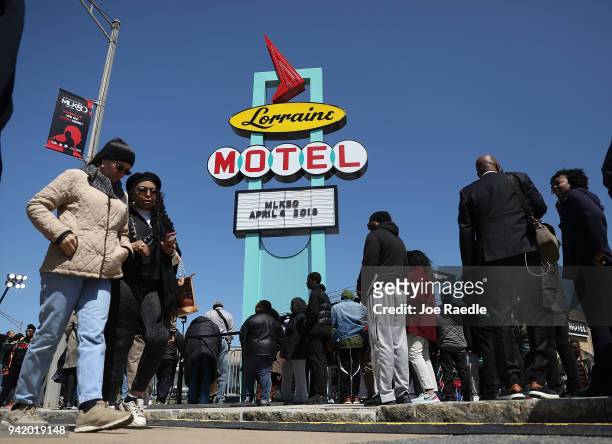 People gather at the Lorraine Motel, where Dr. Martin Luther King, Jr. Was assassinated and is now part of the complex of the National Civil Rights...