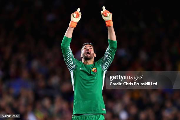 Alisson of AS Roma celebrates after his sides first goal during the UEFA Champions League Quarter Final first leg match between FC Barcelona and AS...