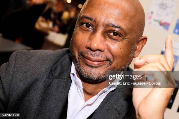 Producer and director Raoul Peck poses during Paris Book Fair 2018 at Parc Des Expositions Porte de Versailles, France on .