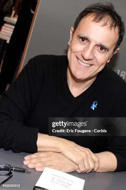 Presenter and Actor Thierry Beccaro poses during Paris Book Fair 2018 at Parc Des Expositions Porte de Versailles, France on .