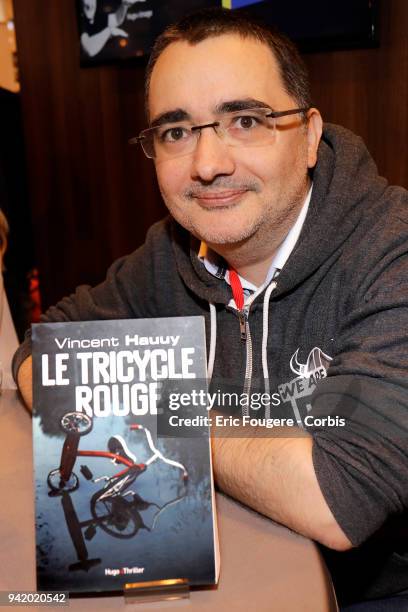 Writer Vincent Hauuy poses during Paris Book Fair 2018 at Parc Des Expositions Porte de Versailles, France on .