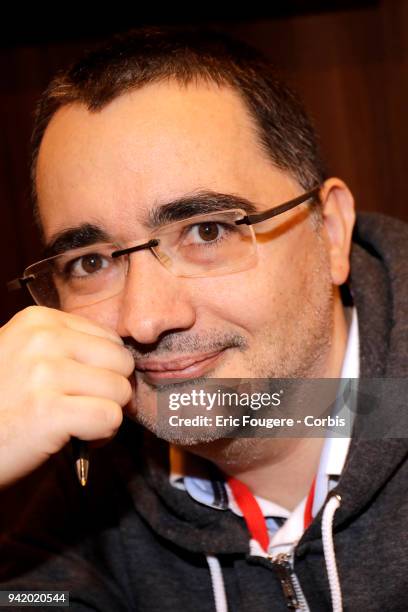 Writer Vincent Hauuy poses during Paris Book Fair 2018 at Parc Des Expositions Porte de Versailles, France on .