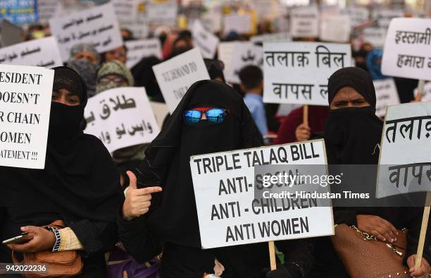 Muslim women protest against the triple talaq bill passed by the Lok Sabha at Ramlila Ground on April 4, 2018 in New Delhi, India.