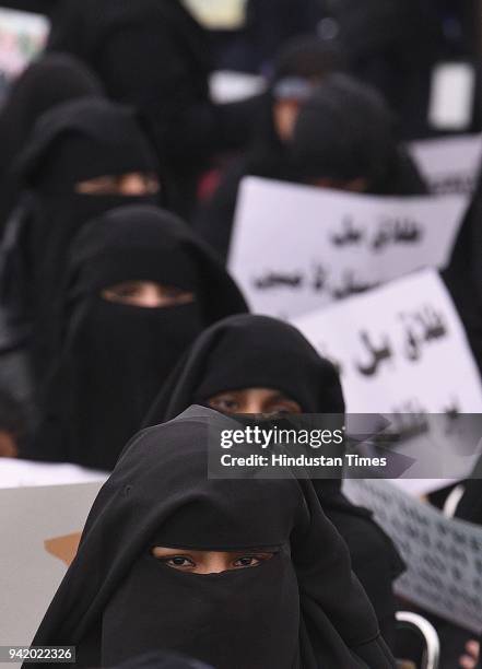 Muslim women protest against the triple talaq bill passed by the Lok Sabha at Ramlila Ground on April 4, 2018 in New Delhi, India.