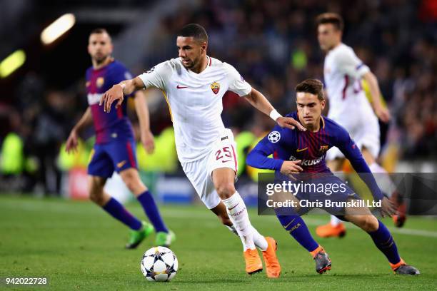 Bruno Peres of AS Roma is tracked by Denis Suarez of FC Barcelona during the UEFA Champions League Quarter Final first leg match between FC Barcelona...