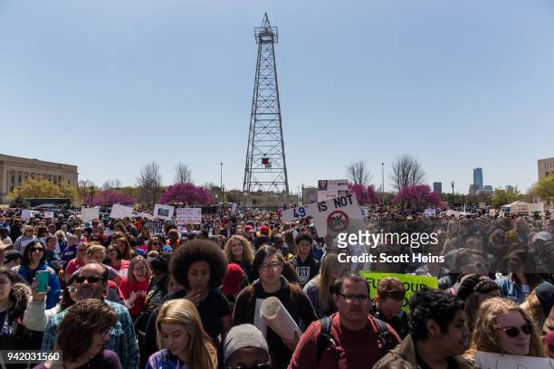 Thousands gathered outside the Oklahoma state Capitol building during the third day of a statewide education walkout on April 4, 2018 in Oklahoma...