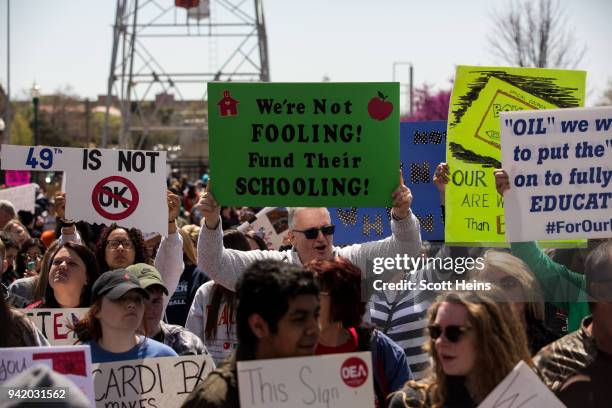 Thousands gathered outside the Oklahoma state Capitol building during the third day of a statewide education walkout on April 4, 2018 in Oklahoma...