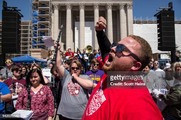 Putnam City West band director Edward Hudson leads the The Oklahoma Teacher Walkout Band, an improvised group of music teachers from across the...