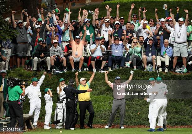 Gary Nicklaus, Jr. Celebrates hitting a hole-in-one on the ninth tee with his grandfather Jack Nicklaus, Gary Player and Tom Watson during the Par 3...