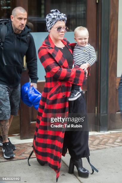 Carey Hart, Pink and Jameson Moon Hart are seen on April 4, 2018 in New York City.