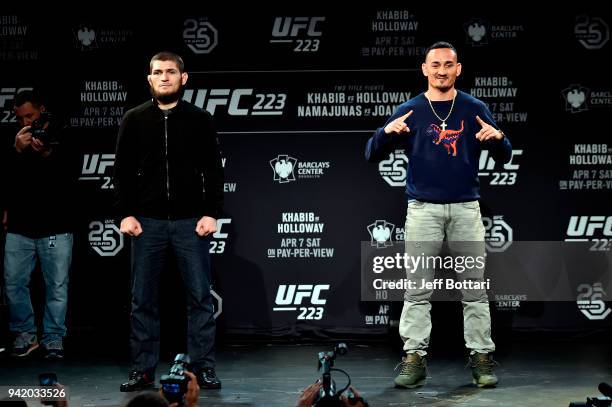 Khabib Nurmagomedov of Russia and Max Holloway pose for the media and fans during the UFC 223 Press Conference at the Music Hall of Williamsburg on...