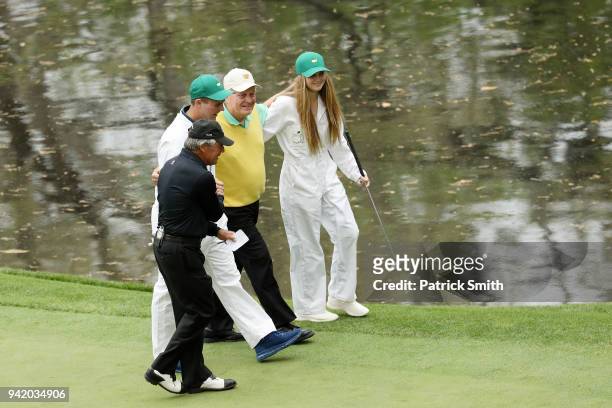 Gary Nicklaus, Jr. Celebrates hitting a hole-in-one on the ninth hole with his grandfather Jack Nicklaus , Gary Player and his sister during the Par...