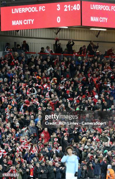 Liverpool fans celebrate a 3-0 first leg victory at the final whistle during the UEFA Champions League Quarter-Final First Leg match between...