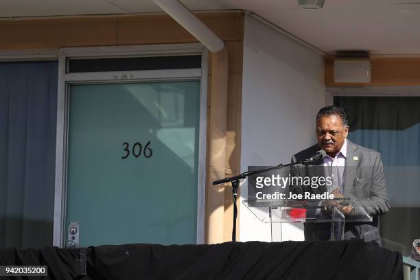 Rev. Jesse Jackson, Sr. Speaks from the balcony outside room 306 at the Lorraine Motel, where he was when Dr. Martin Luther King, Jr. Was...