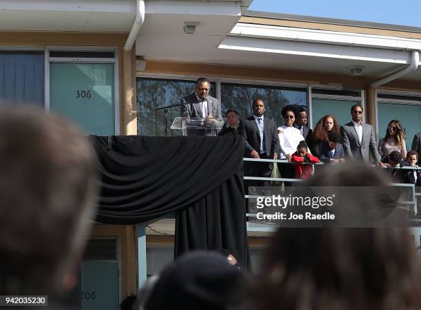 Rev. Jesse Jackson, Sr. Speaks, as his family stands near him, from the balcony outside room 306 at the Lorraine Motel, where he was when Dr. Martin...