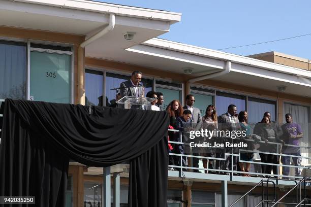 Rev. Jesse Jackson, Sr. Speaks, as his family stands near him, from the balcony outside room 306 at the Lorraine Motel, where he was when Dr. Martin...