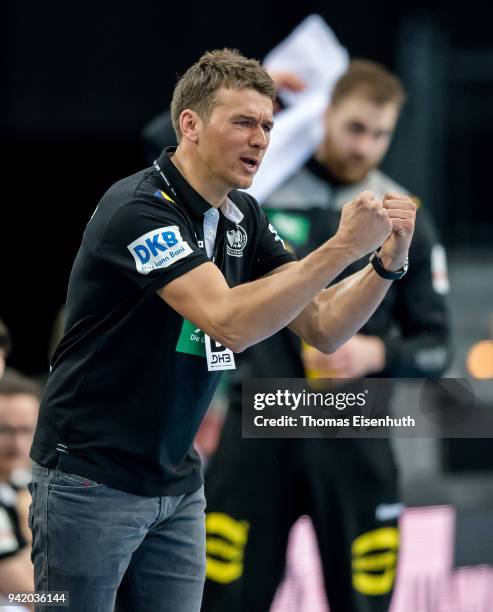 Coach Christian Prokop of Germany celebrates during the handball international friendly match between Germany and Serbia at Arena Leipzig on April 4,...