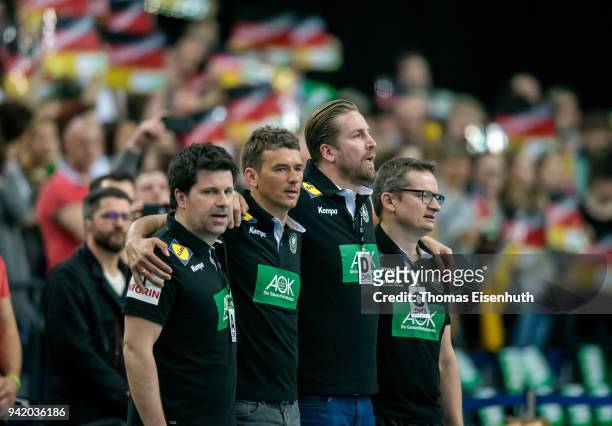 Assistant coach Alexander Haase, coach Christian Prokop, Team manager Oliver Roggisch and assistant coach Sven Raab of Germany during the national...