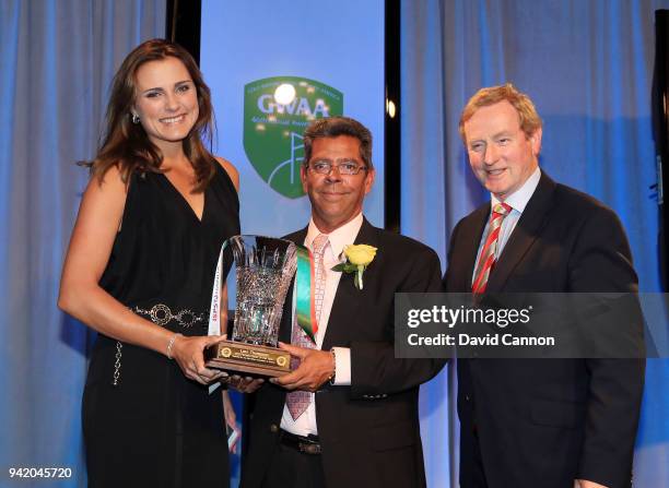 Steve DiMeglio and Edna Kenny pose with Female Player of the Year Lexi Thompson at the 2018 Golf Writers Association of America 46th annual awards...