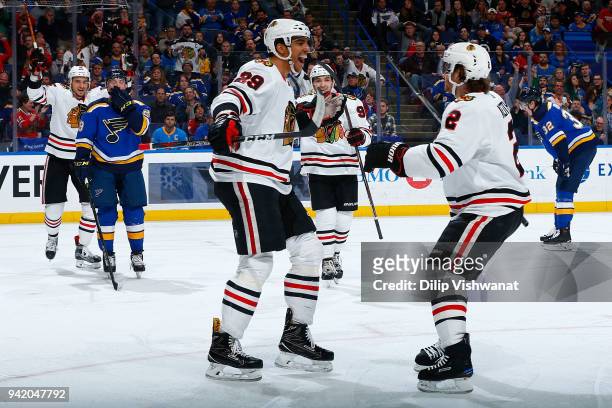 Andreas Martinsen of the Chicago Blackhawks celebrates after scoring a goal against the St. Louis Blues at Scottrade Center on April 4, 2018 in St....