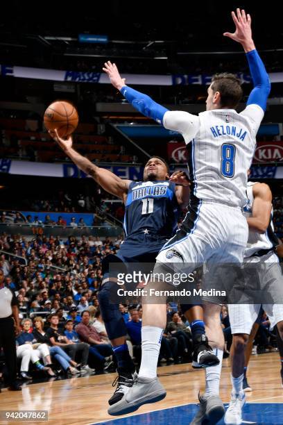 Yogi Ferrell of the Dallas Mavericks shoots the ball during the game against the Orlando Magic on April 4, 2018 at Amway Center in Orlando, Florida....