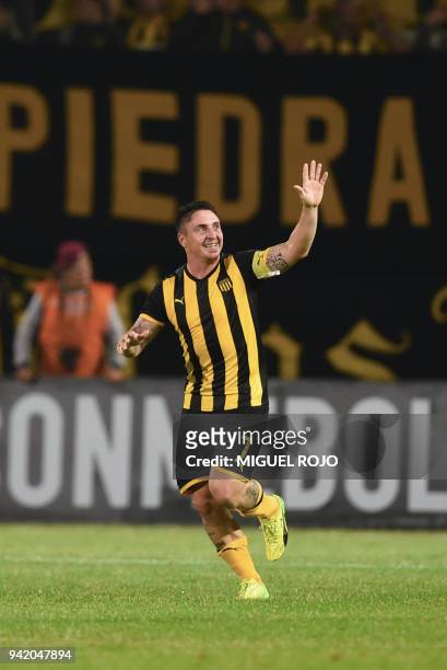 Uruguay's Penarol player Cristian Rodriguez celebrates after scoring a goal against Argentina's Atletico Tucuman during their Libertadores Cup...