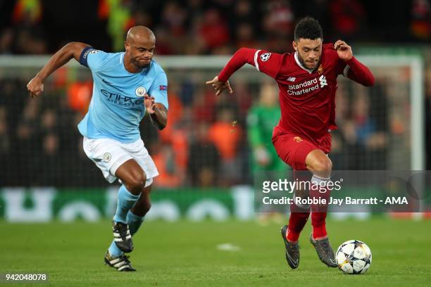 Vincent Kompany of Manchester City and Alex Oxlade-Chamberlain of Liverpool during the UEFA Champions League Quarter Final first leg match between...