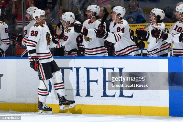 Andreas Martinsen of the Chicago Blackhawks is congratulated after scoring a goal against the St. Louis Blues at Scottrade Center on April 4, 2018 in...