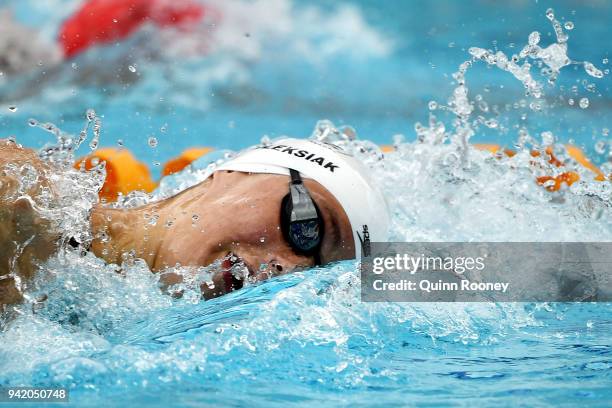 Penny Oleksiak of Canada competes during the Women's 200m Freestyle Heat 1 on day one of the Gold Coast 2018 Commonwealth Games at Optus Aquatic...