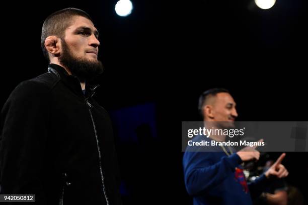 Khabib Nurmagomedov of Russia and Max Holloway pose during the UFC 223 Press Conference at the Music Hall of Williamsburg on April 4, 2018 in...