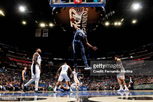 Jalen Jones of the Dallas Mavericks dunks the ball during the game against the Orlando Magic on April 4, 2018 at Amway Center in Orlando, Florida....