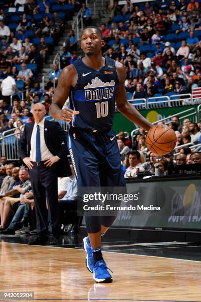 Dorian Finney-Smith of the Dallas Mavericks handles the ball during the game against the Orlando Magic on April 4, 2018 at Amway Center in Orlando,...
