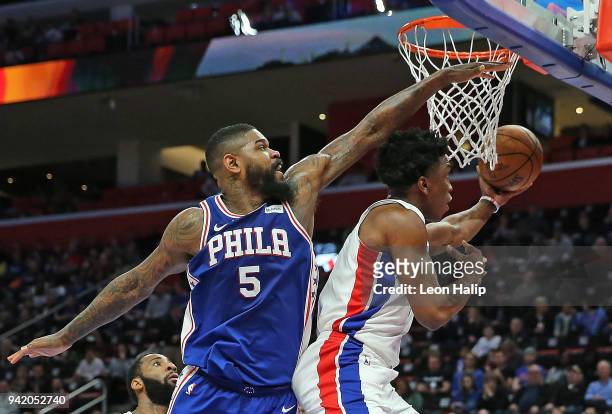 Stanley Johnson of the Detroit Pistons shoots the ball as Amir Johnson of the Philadelphia 76ers defends during the fourth quarter of the game at...