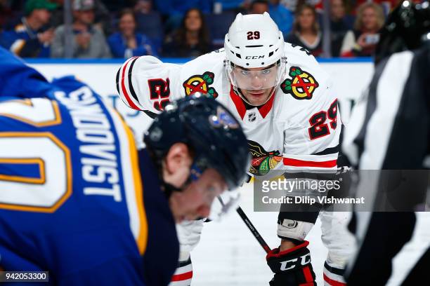 Andreas Martinsen of the Chicago Blackhawks lines up for a face off against the St. Louis Blues at Scottrade Center on April 4, 2018 in St. Louis,...