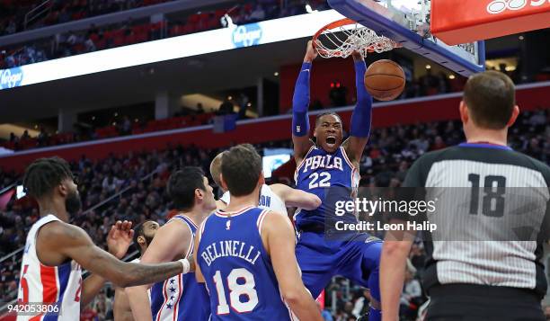 Richaun Holmes of the Philadelphia 76ers celebrates after scoring in the fourth quarter of the game against the Detroit Pistons at Little Caesars...