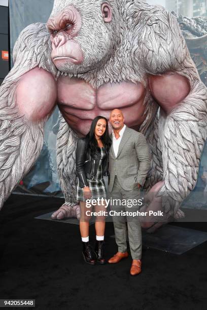 Simone Alexandra Johnson and Dwayne Johnson attend the premiere of Warner Bros. Pictures' "Rampage" at Microsoft Theater on April 4, 2018 in Los...