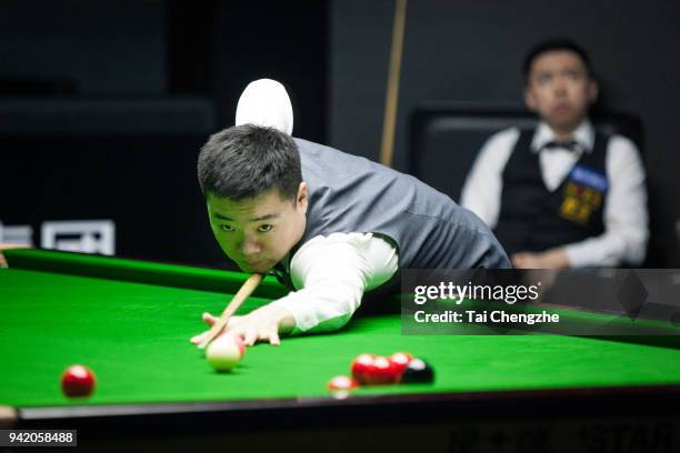 Ding Junhui of China plays a shot in the second round match against Xiao Guodong of China during day three of the 2018 China Open at Olympic Sports...