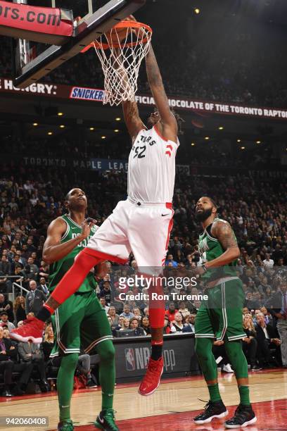 Lucas Nogueira of the Toronto Raptors dunks against the Boston Celtics on April 4, 2018 at the Air Canada Centre in Toronto, Ontario, Canada. NOTE TO...