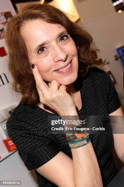 Writer Veronique Olmi poses during Paris Book Fair 2018 at Parc Des Expositions Porte de Versailles, France on .