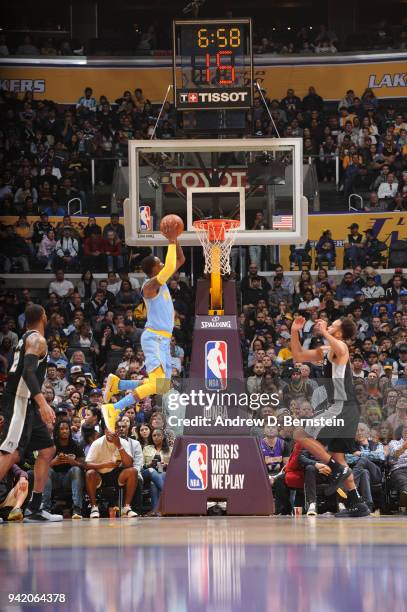 Kentavious Caldwell-Pope of the Los Angeles Lakers dunks against the San Antonio Spurs on April 4, 2018 at STAPLES Center in Los Angeles, California....