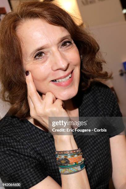 Writer Veronique Olmi poses during Paris Book Fair 2018 at Parc Des Expositions Porte de Versailles, France on .