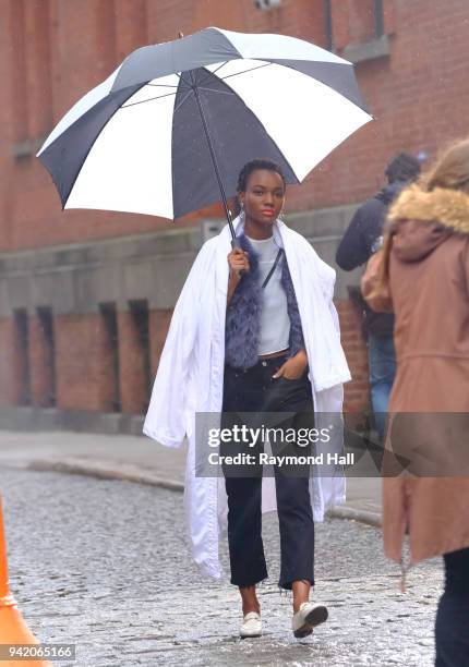 Model Herieth Paul is seen during a photoshoot for Maybelline in Tribeca on April 4, 2018 in New York City.