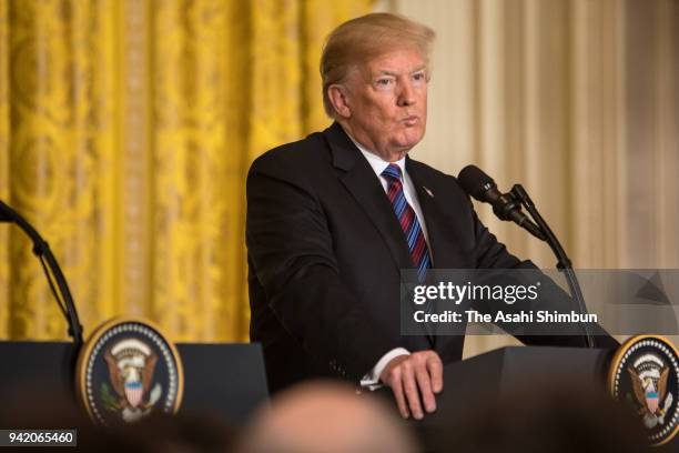 President Donald Trump attends a joint news conference in the East Room of the White House April 3, 2018 in Washington, DC. Marking their 100th...